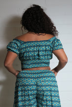 Load image into Gallery viewer, Emma&#39;s Emporium wide leg peacock print cotton palazzo flare trouser. Shope Emma&#39;s Emporium online, for retail and wholesale fair trade ethical women&#39;s alternative clothing, gifts and festival fashion. Hippy Hippie clothes, colourful and unique.
