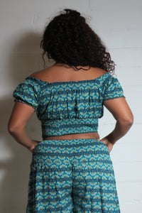 Emma's Emporium wide leg peacock print cotton palazzo flare trouser. Shope Emma's Emporium online, for retail and wholesale fair trade ethical women's alternative clothing, gifts and festival fashion. Hippy Hippie clothes, colourful and unique.