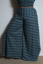 Load image into Gallery viewer, Emma&#39;s Emporium wide leg peacock print cotton palazzo flare trouser. Shope Emma&#39;s Emporium online, for retail and wholesale fair trade ethical women&#39;s alternative clothing, gifts and festival fashion. Hippy Hippie clothes, colourful and unique.
