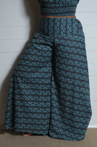 Emma's Emporium wide leg peacock print cotton palazzo flare trouser. Shope Emma's Emporium online, for retail and wholesale fair trade ethical women's alternative clothing, gifts and festival fashion. Hippy Hippie clothes, colourful and unique.