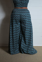 Load image into Gallery viewer, Emma&#39;s Emporium wide leg peacock print cotton palazzo flare trouser. Shope Emma&#39;s Emporium online, for retail and wholesale fair trade ethical women&#39;s alternative clothing, gifts and festival fashion. Hippy Hippie clothes, colourful and unique.
