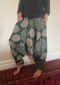 Emma's Emporium fleece genie harem trousers, loose fit warm winter  hippy pants, made from machine washable vegan fleece, in bright flower or paisley design. Slow fashion, ethically sourced hippie festival hippy fashion.