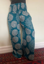 Load image into Gallery viewer, New In! Palazzo Pants! Emma&#39;s Emporium fleece genie harem trousers, loose fit warm winter  hippy pants, made from machine washable vegan fleece, in bright flower or paisley design. Slow fashion, ethically sourced hippie festival hippy fashion.
