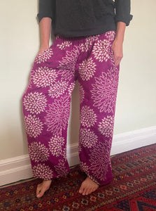 Emma's Emporium fleece genie harem trousers, loose fit warm winter  hippy pants, made from machine washable vegan fleece, in bright floral magenta design.