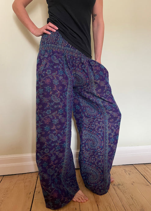 New In! Palazzo Pants! Emma's Emporium fleece genie harem trousers, loose fit warm winter  hippy pants, made from machine washable vegan fleece, in bright flower or paisley design. Slow fashion, ethically sourced hippie festival hippy fashion.