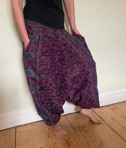 Emma's Emporium fleece genie harem trousers, loose fit warm winter  hippy pants, made from machine washable vegan fleece, in bright flower or paisley design. Slow fashion, ethically sourced hippie festival hippy fashion.