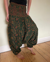 Load image into Gallery viewer, Emma&#39;s Emporium fleece genie harem trousers, loose fit warm winter  hippy pants, made from machine washable vegan fleece, in bright flower or paisley design. Slow fashion, ethically sourced hippie festival hippy fashion.
