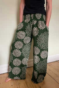 New In! Palazzo Pants! Emma's Emporium fleece genie harem trousers, loose fit warm winter  hippy pants, made from machine washable vegan fleece, in bright flower or paisley design. Slow fashion, ethically sourced hippie festival hippy fashion.
