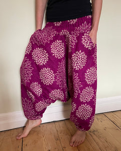 Emma's Emporium fleece genie harem trousers, loose fit warm winter  hippy pants, made from machine washable vegan fleece, in bright flower or paisley design. Slow fashion, ethically sourced hippie festival hippy fashion.