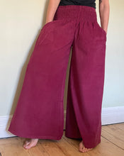 Load image into Gallery viewer, New In! Palazzo Pants! Emma&#39;s Emporium corduroy Palazzo trousers, loose fit warm winter  hippy pants, made from fine soft cotton needle cord. Slow fashion, ethically sourced hippie festival hippy fashion.
