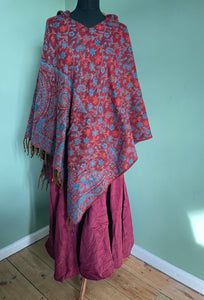 BUY NOW ONLINE! Emma's Emporium hooded fleece poncho, bold flower print, machine washable vegan fleece. Buy slow ethical women's hippy fashions online, wholesale and retail. Emma's Emporium, festival fashion from India, fair trade from around the world.