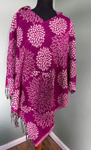 Load image into Gallery viewer, BUY NOW ONLINE! Emma&#39;s Emporium hooded fleece poncho, bold flower print, machine washable vegan fleece. Buy slow ethical women&#39;s hippy fashions online, wholesale and retail. Emma&#39;s Emporium, festival fashion from India, fair trade from around the world.
