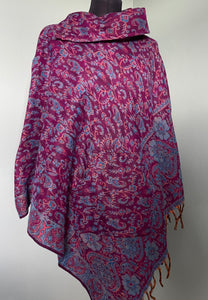 BUY NOW ONLINE! Emma's Emporium hooded fleece poncho, bold flower print, machine washable vegan fleece. Buy slow ethical women's hippy fashions online, wholesale and retail. Emma's Emporium, festival fashion from India, fair trade from around the world.