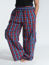 Load image into Gallery viewer, Buy now online at Emma's Emporium! Unisex Plaid Check Cargo Trousers. Experience comfort and style with these loose fit trousers in plaid cotton. Loose fit with an elastic waistband and lots of pockets, they offer a flattering, flexible fit and convenient relaxed style. Emma's Emporium ethical fashion, alternative women's clothing, festival hippie styles.
