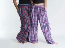 Load image into Gallery viewer, Buy now online at Emma's Emporium! Unisex Plaid Check Cargo Trousers. Experience comfort and style with these loose fit trousers in plaid cotton. Loose fit with an elastic waistband and lots of pockets, they offer a flattering, flexible fit and convenient relaxed style. Emma's Emporium ethical fashion, alternative women's clothing, festival hippie styles.
