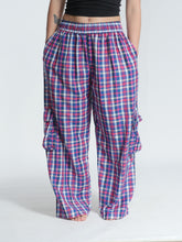 Load image into Gallery viewer, Buy now online at Emma's Emporium! Unisex Plaid Check Cargo Trousers. Experience comfort and style with these loose fit trousers in plaid cotton. Loose fit with an elastic waistband and lots of pockets, they offer a flattering, flexible fit and convenient relaxed style. Emma's Emporium ethical fashion, alternative women's clothing, festival hippie styles.
