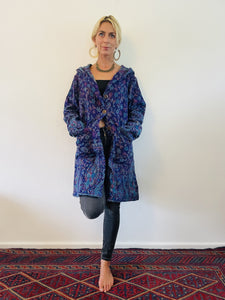 Emma's Emporium soft warm vegan wool unisex gender neutral long jacket cardigans with coconut button fastening, front pockets and oversized hood. Buy now from Emma's Emporium online shop for men and women's hippie festival clothing and gifts.