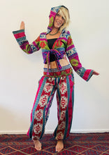 Load image into Gallery viewer, Emma&#39;s Emporium unisex gender neutral vegan friendly acrylic hooded pixie tie top, warm fleece winter hippie flared sleeve fair-trade pixie hood top.
