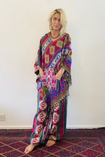 Load image into Gallery viewer, Colourful geometric fleecy warm hippie fair-trade poncho, with front pocket, unisex gender neutral clothing made from vegan wool.
