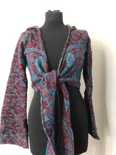 Load image into Gallery viewer, Emma&#39;s Emporium ethical global fashion. boho style pixie wrap top. Crop top cardi in paisley pattern with hood and trumpet sleeves.
