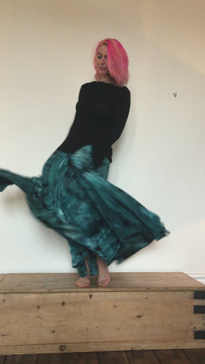 Video of Emma's Emporium maxi skirt. Buy online now from Emma's Emporium! Emma's Emporium Tie Dye full length gypsy maxi skirt, in vibrant tie dye rayon, with pockets. Super fun hippy tie dye beach festival skirt, Emma's Emporium hippy and alternative women's clothing.