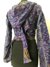 Load image into Gallery viewer, Emma&#39;s Emporium ethical global fashion. boho style pixie wrap top. Crop top cardi in paisley pattern with hood and trumpet sleeves.
