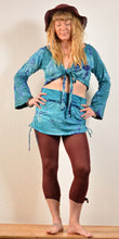 Load image into Gallery viewer, Emma&#39;s Emporium cotton lycra tie dye summer mini skirt, super colourful hippie tie dye asymmetric drawstring mini skirt, ideal for festival days and all night raves. Available to buy online from Emma&#39;s Emporium.
