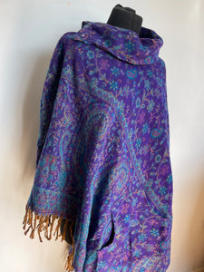 Emma's Emporium Ethical global fashion for lovers of boho styles. Vegan fleece paisley winter poncho with collar and pockets.
