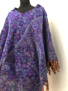Emma's Emporium Ethical global fashion for lovers of boho styles. Vegan fleece paisley winter poncho with hood and pockets.