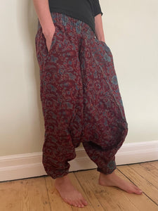 Emma's Emporium fleece genie harem trousers, loose fit warm winter  hippy pants, made from machine washable vegan fleece, in bright flower or paisley design. Slow fashion, ethically sourced hippie festival hippy fashion.